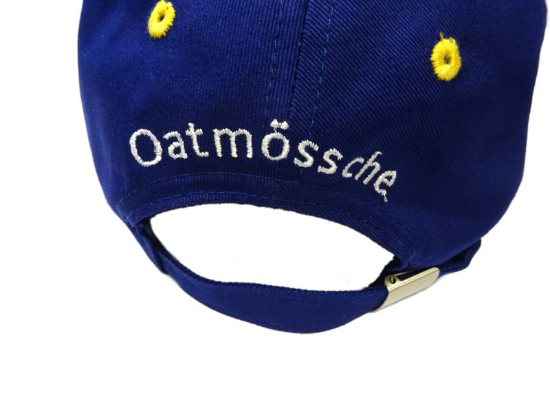 Geborduurde pet oatmössche achterkant